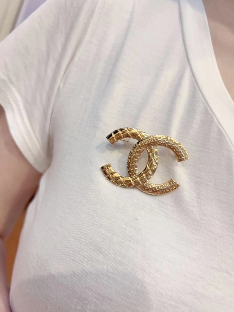 Ch**el brooches